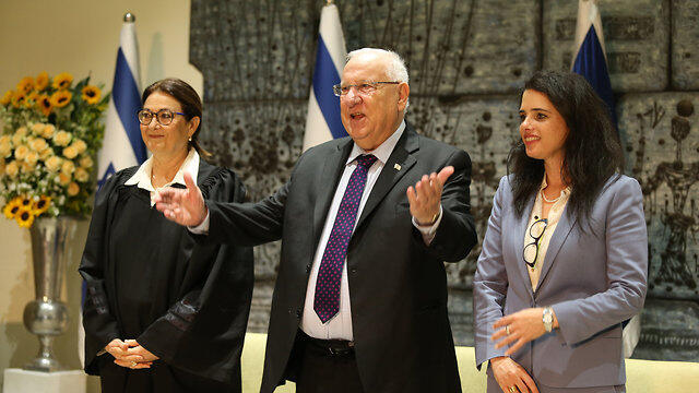 L-R: Chief Justice Hayut, President Rivlin and Justice Minister Shaked (צילום: עמית שאבי) L-R: Chief Justice Hayut, President Rivlin and Justice Minister Shaked