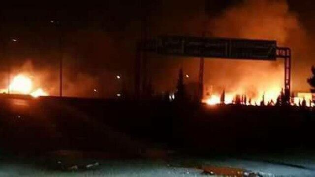 Fire burning in the Syrian base attack Tuesday