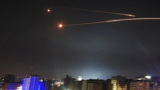 Syrian anti-aircraft missiles in the Damascus night sky