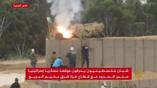 Terrorists stole into Israel, set fire to an abandoned IDF post and planted a Palestinian flag nearby