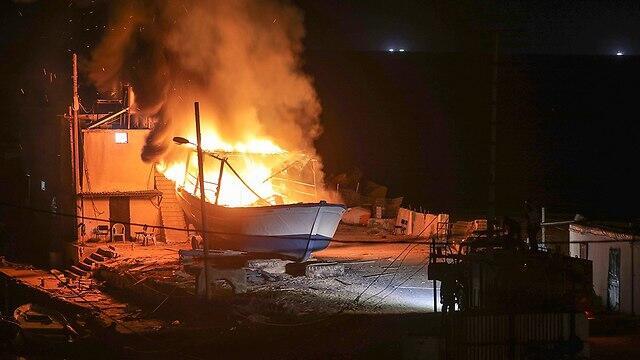 Fishing boat on fire off Gaza coast. The IDF retaliated to Tuesday's infiltration by destroying a Hamas terror tunnel and targets belonging to the organization's naval force