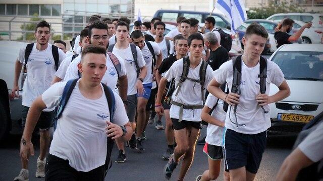 Dozens of teens hold a combat fitness training session in the memory of Staff Sgt. Ronen Lubarsky