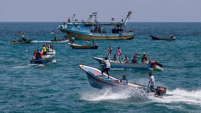 A flotilla out of Gaza was stopped by Hamas, and then the Israeli Navy (צילום: AFP) A flotilla out of Gaza was stopped by Hamas, and then the Israeli Navy