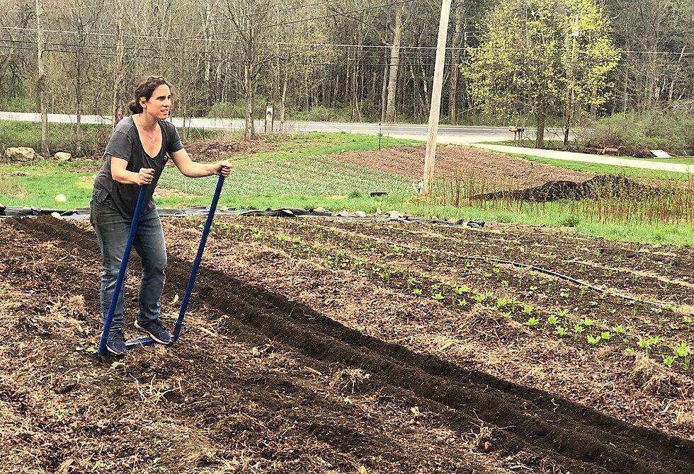 Bonnie Levis working on the farm 