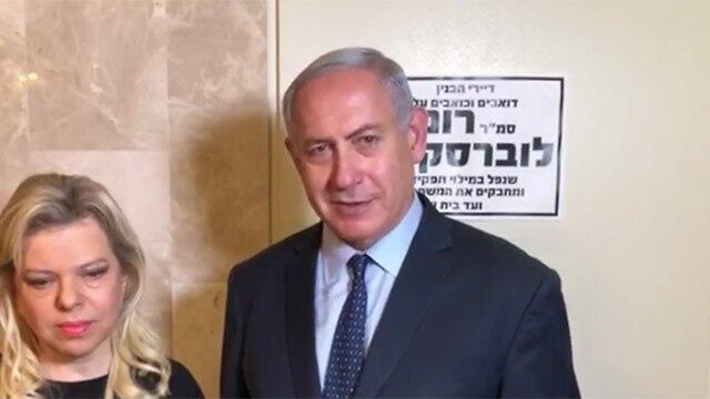 PM Netanyahu (R) alongside his wife. Netanyahu maintained the report was 'more Sarna-style fables'nullnull PM Netanyahu (R) alongside his wife. Netanyahu maintained the report was 'more Sarna-style fables'