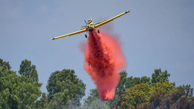 Firefighting planes assisting to put out fire in Karmiya Reserve