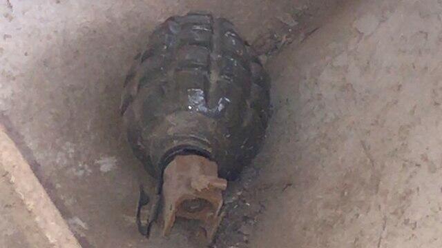 Molotov cocktail tossed by Palestinians into the buffer zone on the fence (צילום: דובר צה"ל ) Molotov cocktail tossed by Palestinians into the buffer zone on the fence