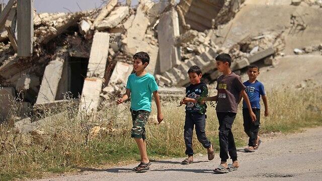 Дети в Дераа. Фото: AFP