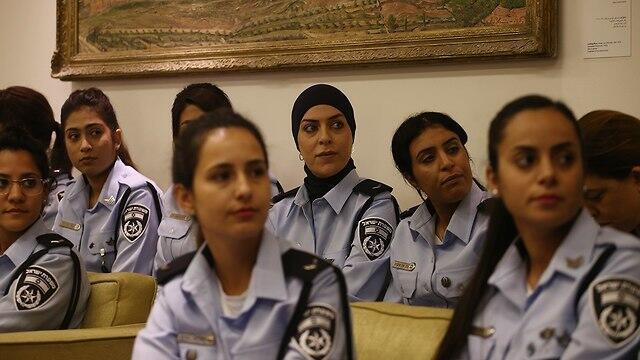 Arab women join the police saying it's their mission  
