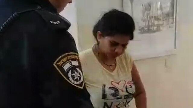 Подозреваемая в суде. Фото: Ишай Порат (צילום: ישי פורת ) Подозреваемая в суде. Фото: Ишай Порат