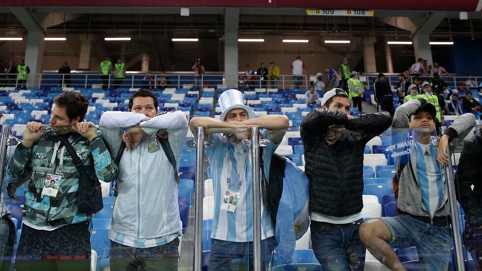 Болельщики Аргентины в шоке. Фото: АР (צילום: AP) Болельщики Аргентины в шоке. Фото: АР