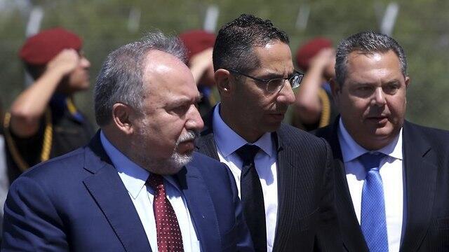 (L-R) Israel Defense Minister Avigdor Lieberman, Greek defense minister Panos Kammenos and Cypriot Defense minister Savvas Angelides