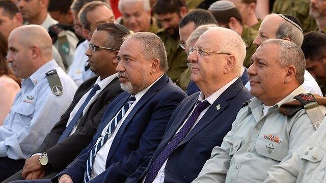 Defense Minister Lieberman next to President Reuven Rivlin and IDF Chief Gadi Eisenkot