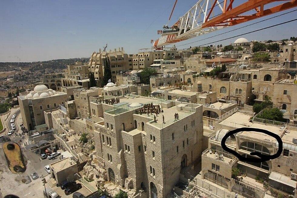 The rooftop on which Marisa Papen posed nude