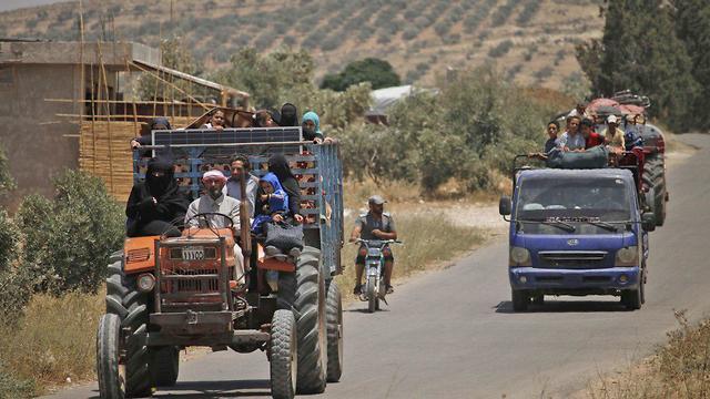 Беженцы в Сирии. Фото: AFP