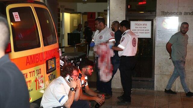 MDA paramedics treating the wounded
