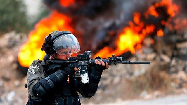 Деревня Кубар, 27 июля. Фото: AFP (צילום: AFP) Деревня Кубар, 27 июля. Фото: AFP