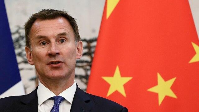 Хант в Китае. Фото: АР (צילום: AP) Хант в Китае. Фото: АР