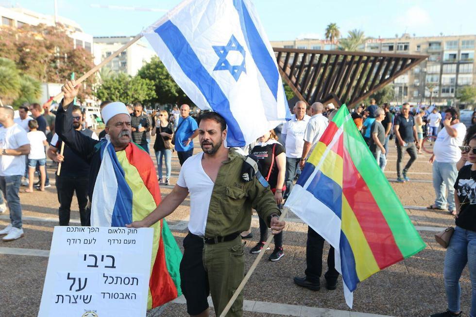 Protesters gather in rabin Sq