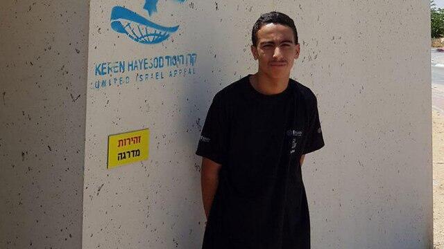 Uriah Hatzroni outside one of the public shelters