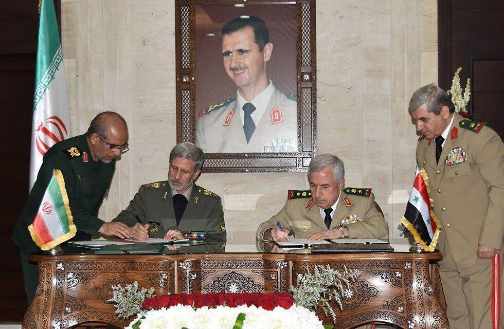 Defense ministers of Iran, Syria sign agreement (צילום: AFP) Defense ministers of Iran, Syria sign agreement