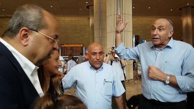 Jewish and Arab MKs squabble at airport