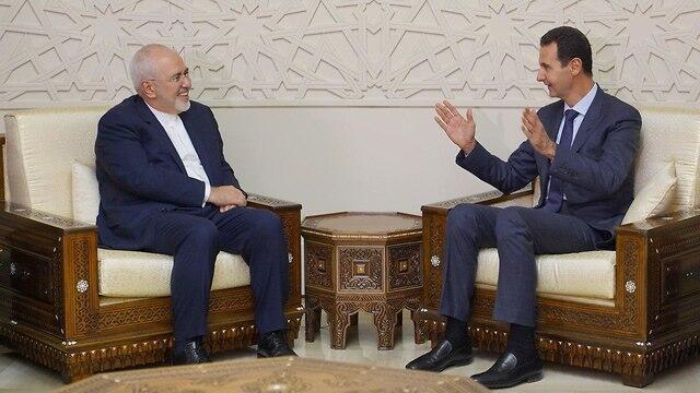 President of Syria Bashar Hafez al-Assad and Iranian Foreign Minister Mohammad Javad Zarifnullnull President of Syria Bashar Hafez al-Assad and Iranian Foreign Minister Mohammad Javad Zarif