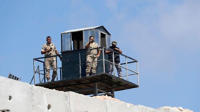 Lebanese soldiers observing the border