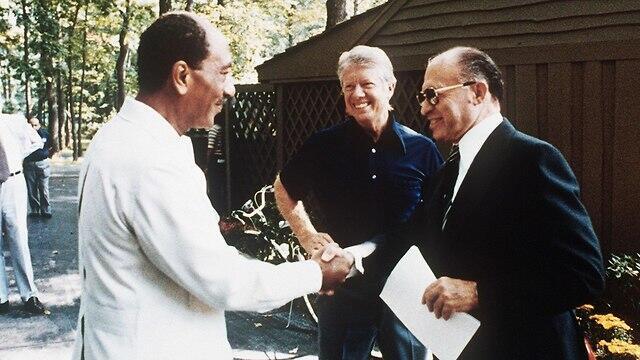 L-R: Anwar Sadat, Jimmy Carter and Menachem Begin in 1979 (Photo: AFP)