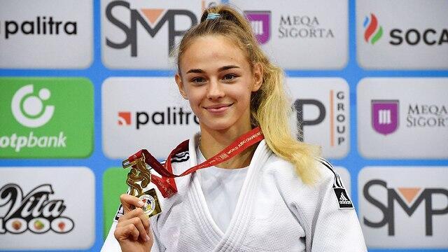 Самая молодая чемпионка мира. Фото: AFP (צילום: AFP) Самая молодая чемпионка мира. Фото: AFP