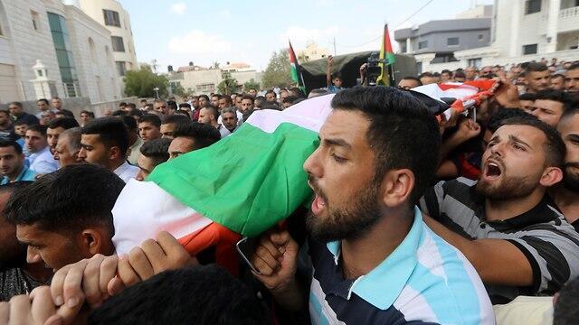 Funeral of Aisha al-Rawbi (צילום: EPA) Funeral of Aisha al-Rawbi