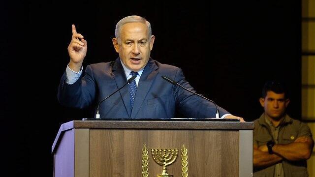 Netanyahu speaking to reporters Sunday