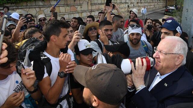 The president speaking to the marchers