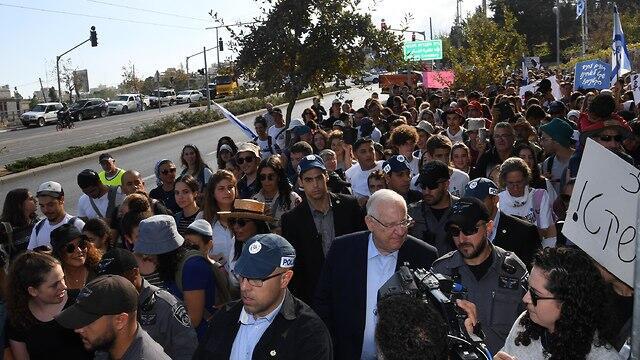 President Rivlin marching with the youth