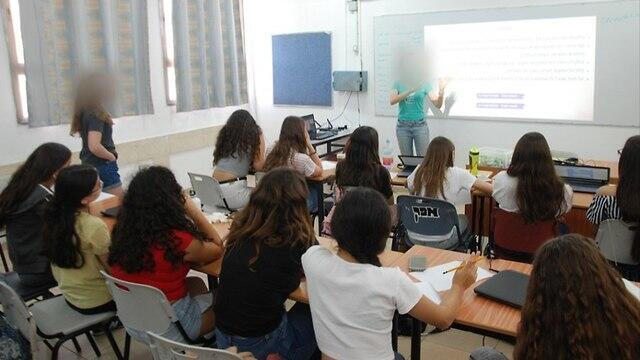 Girls attend a workshop at the CyberGirlz camp in July, 2018 (Photo: David Rawlings) Girls attend a workshop at the CyberGirlz camp in July, 2018