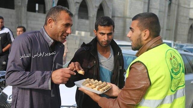 Sweets handed out in Rafah to celebrate Lieberman's resignation
