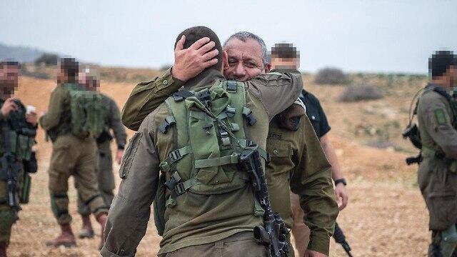 IDF chief Eisenkot with his son, Staff Sgt. G., who serves in Maglan (צילום: דובר צה"ל) IDF chief Eisenkot with his son, Staff Sgt. G., who serves in Maglan
