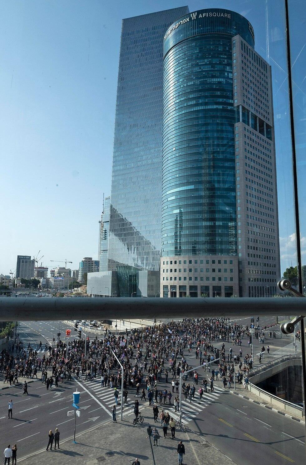 Protesters block the Azrielly Junction in Tel Aviv