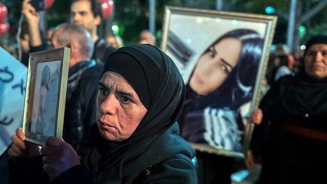 Demonstrators at Rabin Square protest against domestic violence