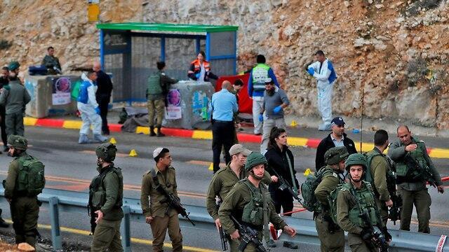 The scene of the shooting attack in the West Bank, December 13, 2018 (צילום: AFP) The scene of the shooting attack in the West Bank, December 13, 2018