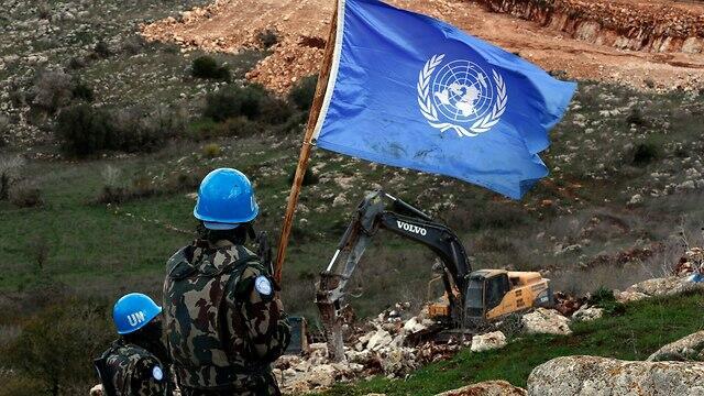 UN peacekeepers observe Israeli excavators working near the southern village of Mays al-Jabal (Photo: AP) UN peacekeepers observe Israeli excavators working near the southern village of Mays al-Jabal