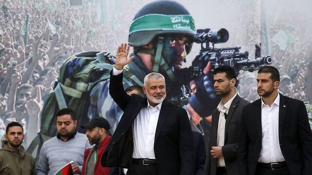 Hamas leader Ismail Haniyeh during parade marking terror group's establishment (צילום: AFP) Hamas leader Ismail Haniyeh during parade marking terror group's establishment