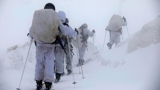 IDF troops amid snowfall in Hermon