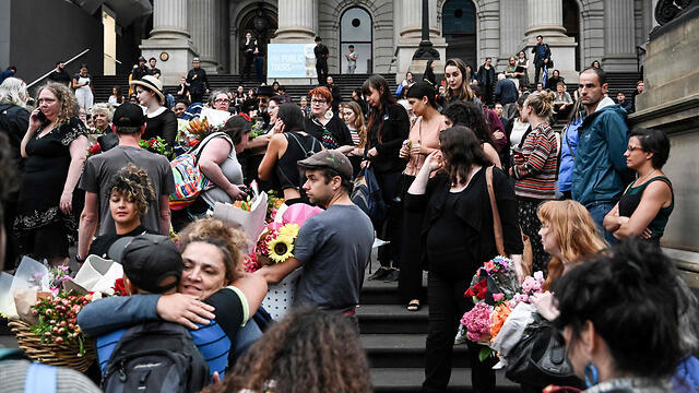 Акция в память убитой. Фото: AFP