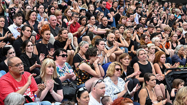 Австралийцы на митинге памяти Айи. Фото: AFP