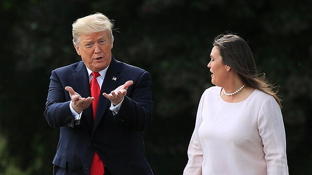President Trump and Sarah Sanders (צילום: AP) President Trump and Sarah Sanders