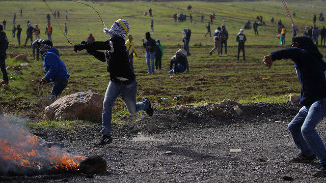 Palestinian rioting near the settlement of Adei Ad in the West Bank  