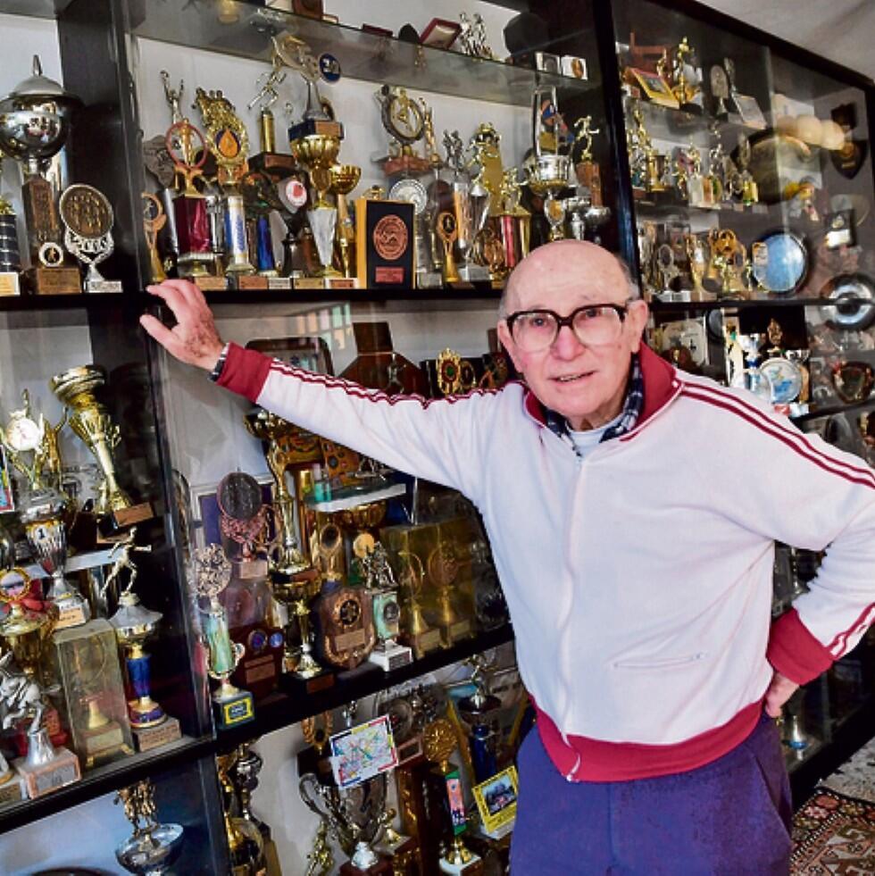 Prof. Shaul Ladany with his accolades