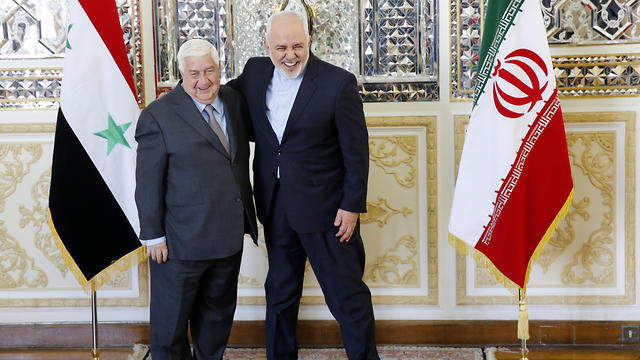 Iranian Foreign Minister Mohammad Javad Zarif (R) greets his Syrian counterpart Walid al-Moallem in Tehran, Iran, 05 February 2019. (Photo: EPA)nullnull Iranian Foreign Minister Mohammad Javad Zarif (R) greets his Syrian counterpart Walid al-Moallem in Tehran, Iran, 05 February 2019. (Photo: EPA)