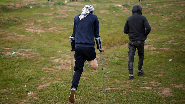 Disabled protester takes part in border riots